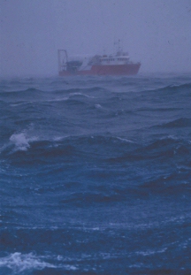 The excavation vessel Pacific Conquest anchored over the wreck site
