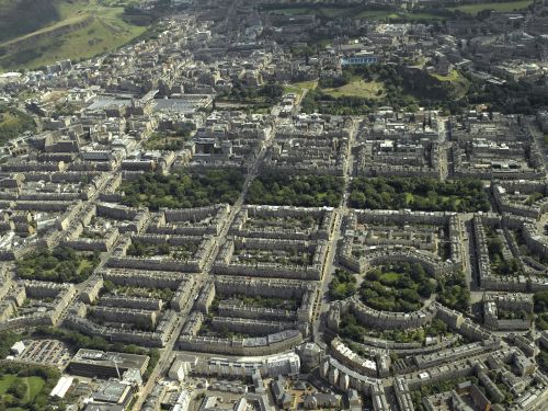 Aerial view of the New Towns of Edinburgh, taken from the north in 2007, looking across to the Castle and Old Town &copy; Historic Environment Scotland