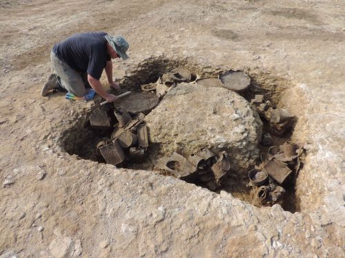 Fleury-sur-Orne, Calvados, Normandy. Excavation of a German machine-gun pit, later filled with Canadian metallic garbage