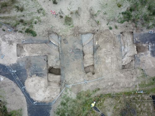 Aerial view of the remains of a German coastal artillery-base, part of the Atlantikwall, hidden under a street