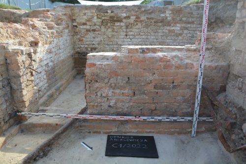 the remains of a building in an archaeological excavation