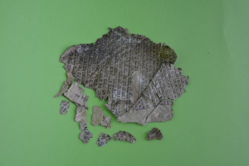 a paper fragment of a Jewish prayer book