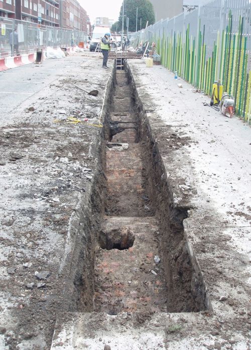 an archaeological trench showing cellar crowns and coal holes