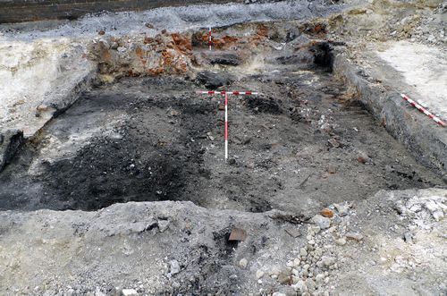 excavated cellar within trench