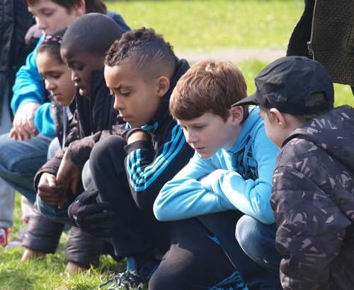 A group of schoolchildren visiting an archaeological excavation in the English industrial town of West Bromwich, an area with high unemployment, low educational attainment and significant levels of poverty and disadvantage. Photograph © Paul Belford.